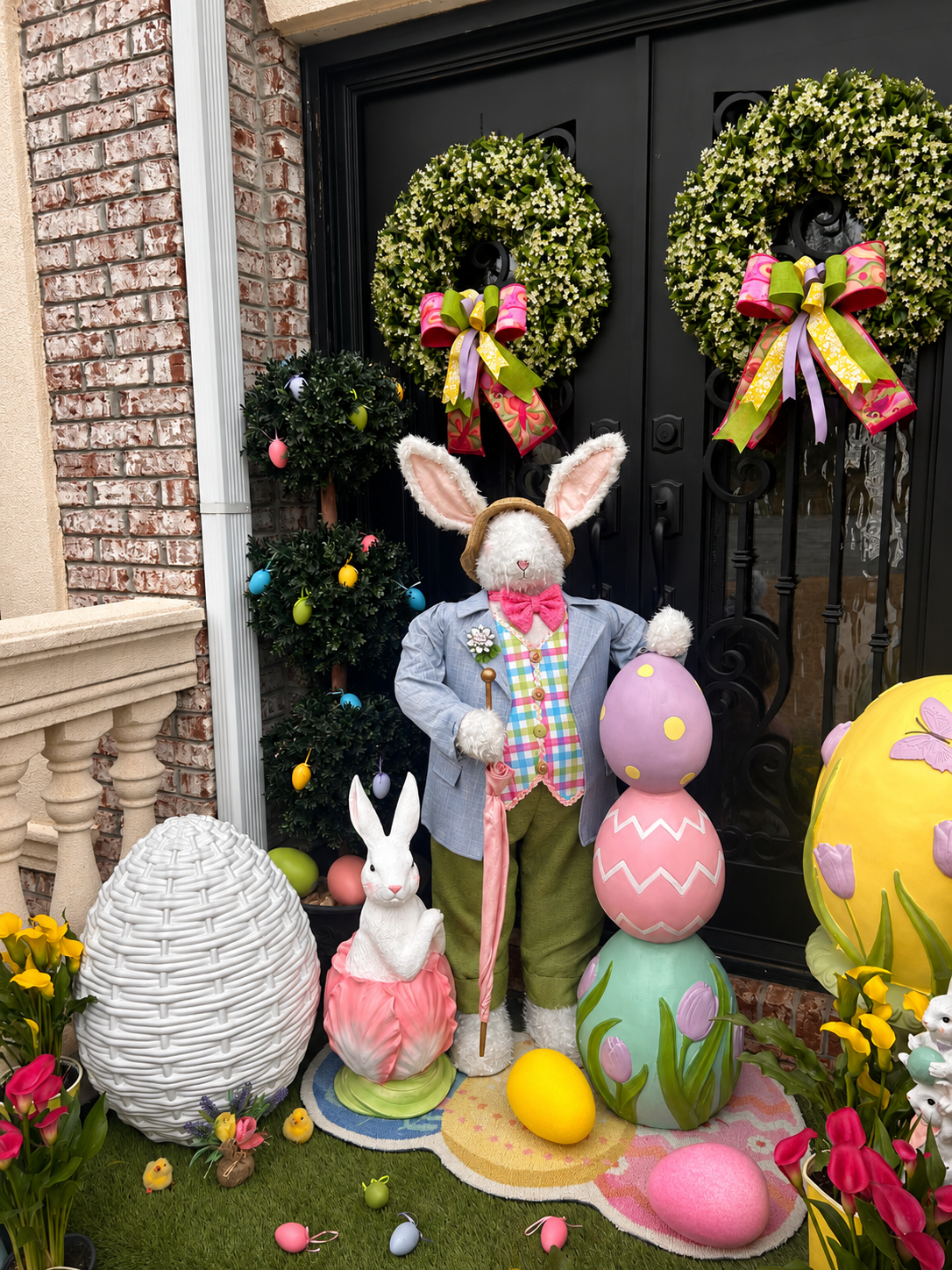 Outdoor Easter display with bunny figure and pastel decor